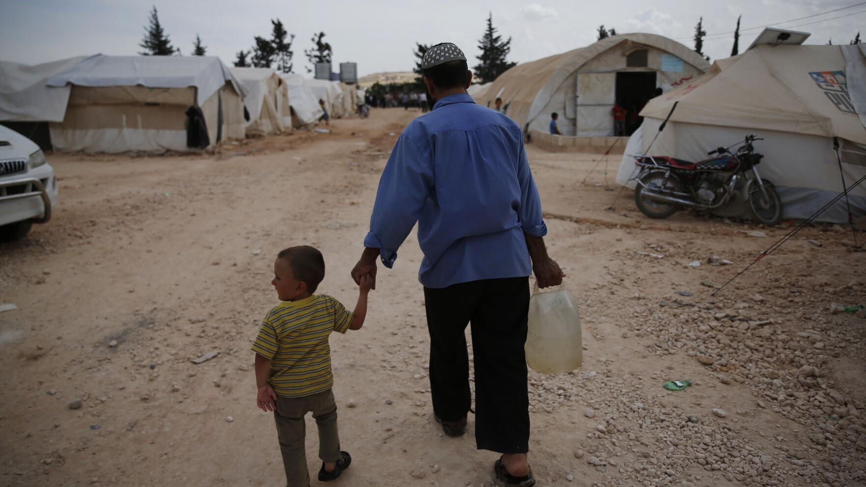 War, natural disasters left record 71 million people internally displaced in 2022, report says